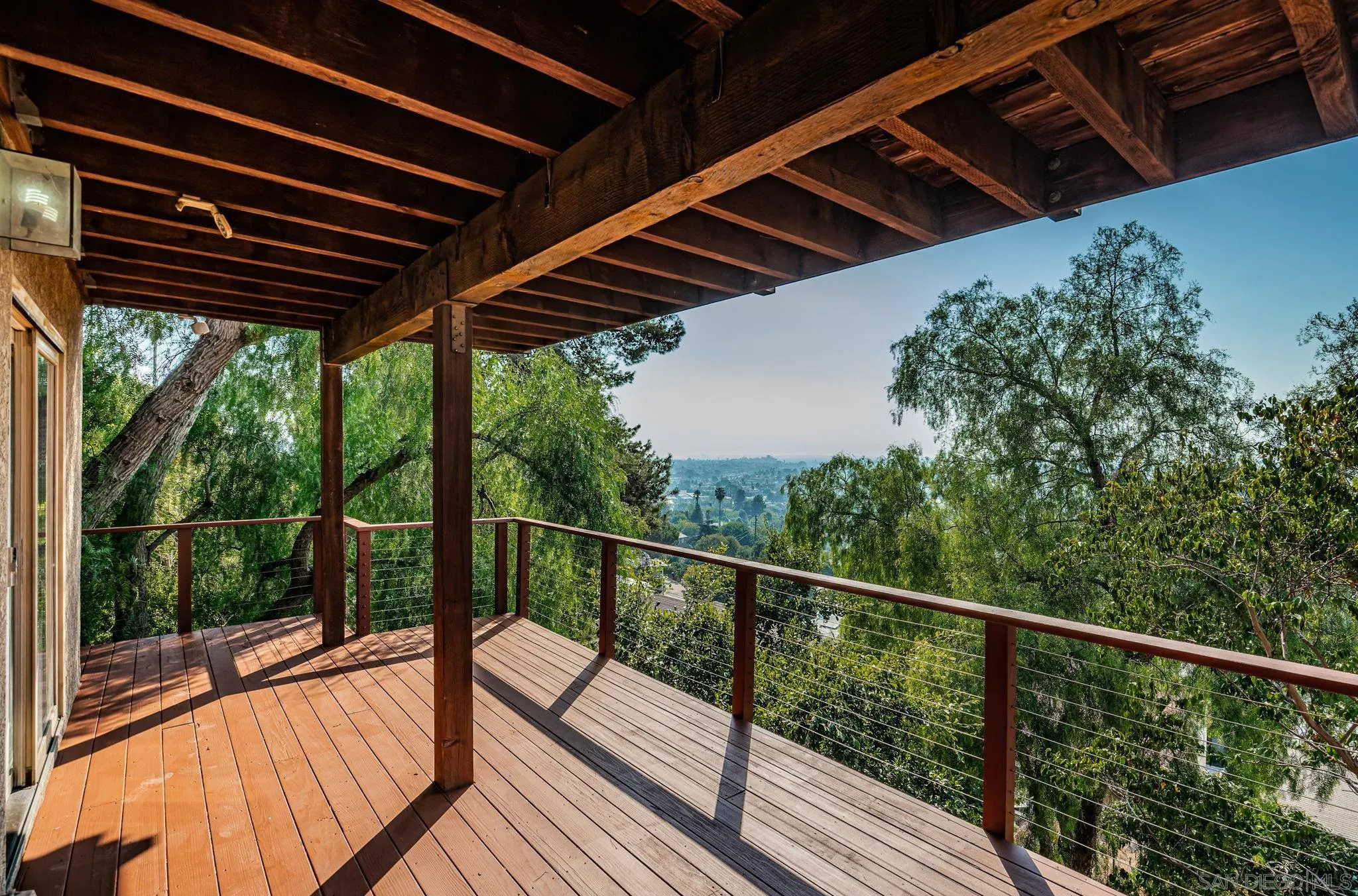 8046 Pasadena Avenue La Mesa, CA 91941 - Photo 25 of 32 a view of balcony with wooden floor