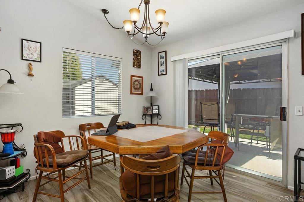 4616 Arrowhead Court Oceanside, CA 92056 - Photo 14 of 50 a dining room with furniture and window