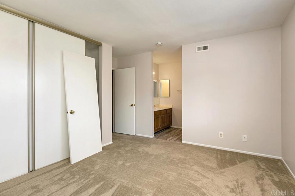 4616 Arrowhead Court Oceanside, CA 92056 - Photo 30 of 50 a view of a big room with closet and windows