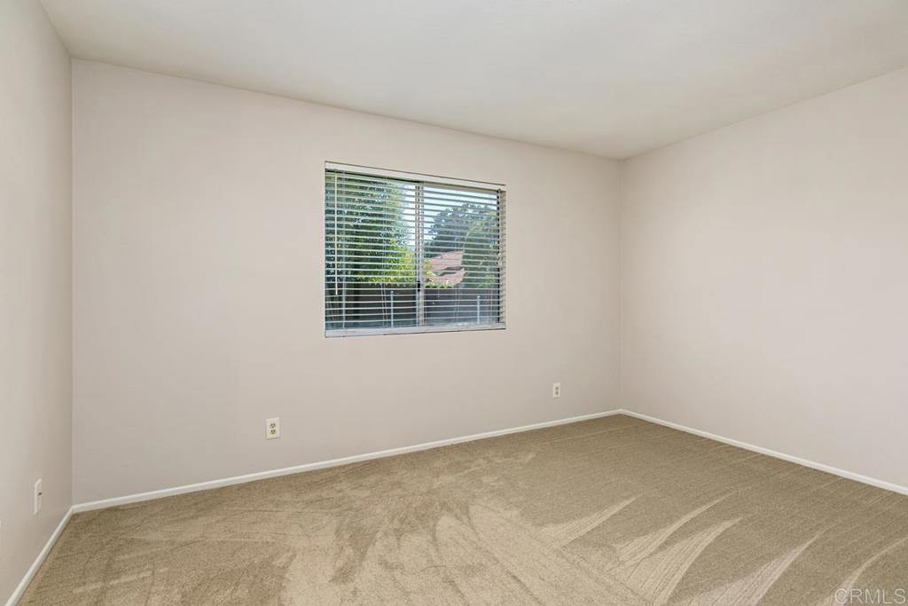4616 Arrowhead Court Oceanside, CA 92056 - Photo 36 of 50 an empty room with a window