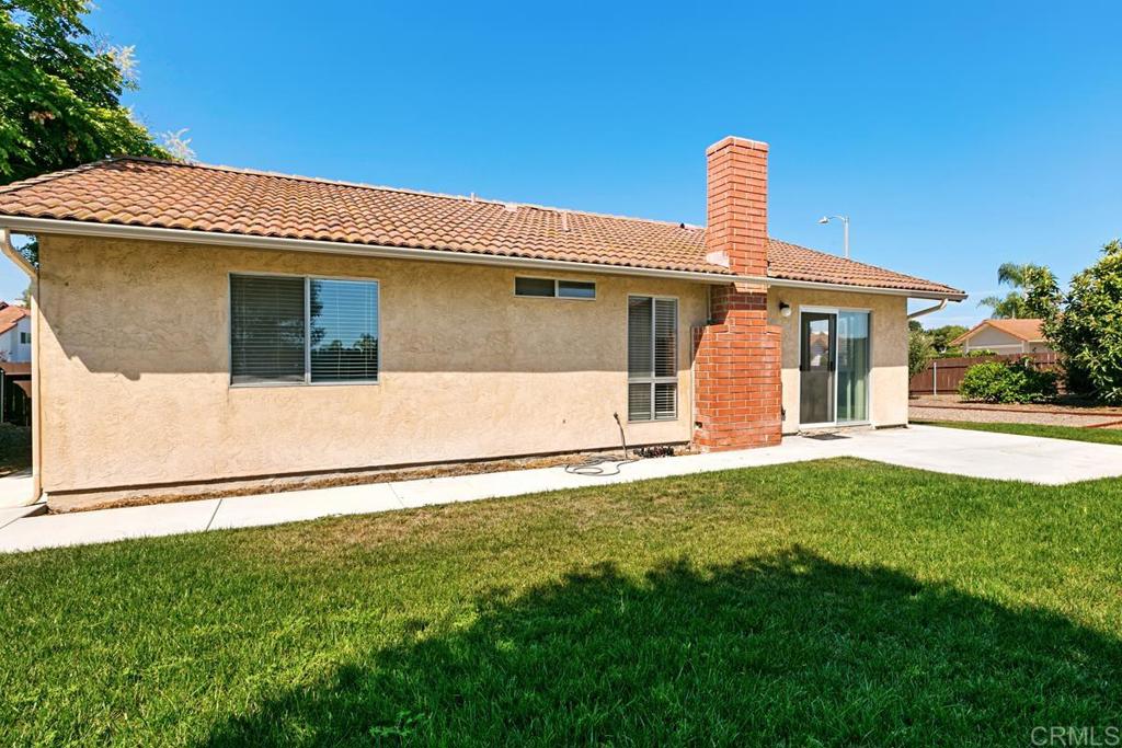 4616 Arrowhead Court Oceanside, CA 92056 - Photo 40 of 50 a front view of a house with garage