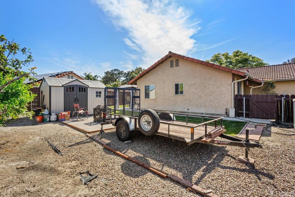 4616 Arrowhead Court Oceanside, CA 92056 - Photo 47 of 50 a white house with a table and chairs
