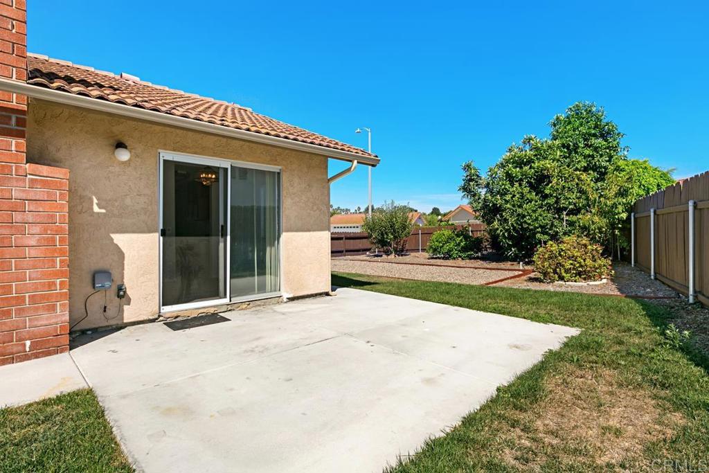 4616 Arrowhead Court Oceanside, CA 92056 - Photo 49 of 50 a view of a house with backyard and porch