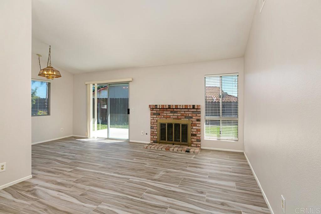 4616 Arrowhead Court Oceanside, CA 92056 - Photo 7 of 50 a view of livingroom with furniture and fireplace