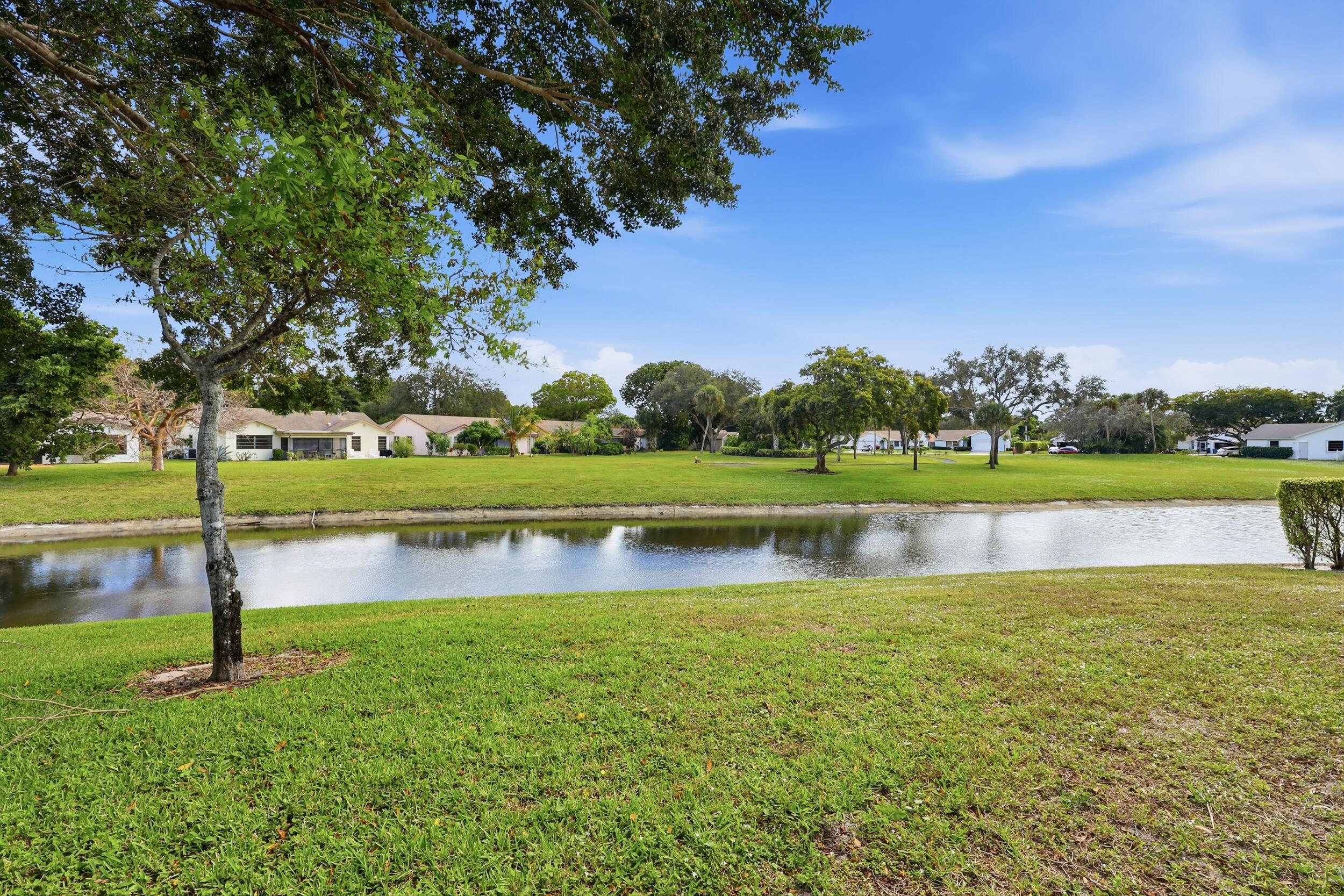 10768 Waterberry Drive Boca Raton, FL 33498 - Photo 19 of 26 a view of a lake