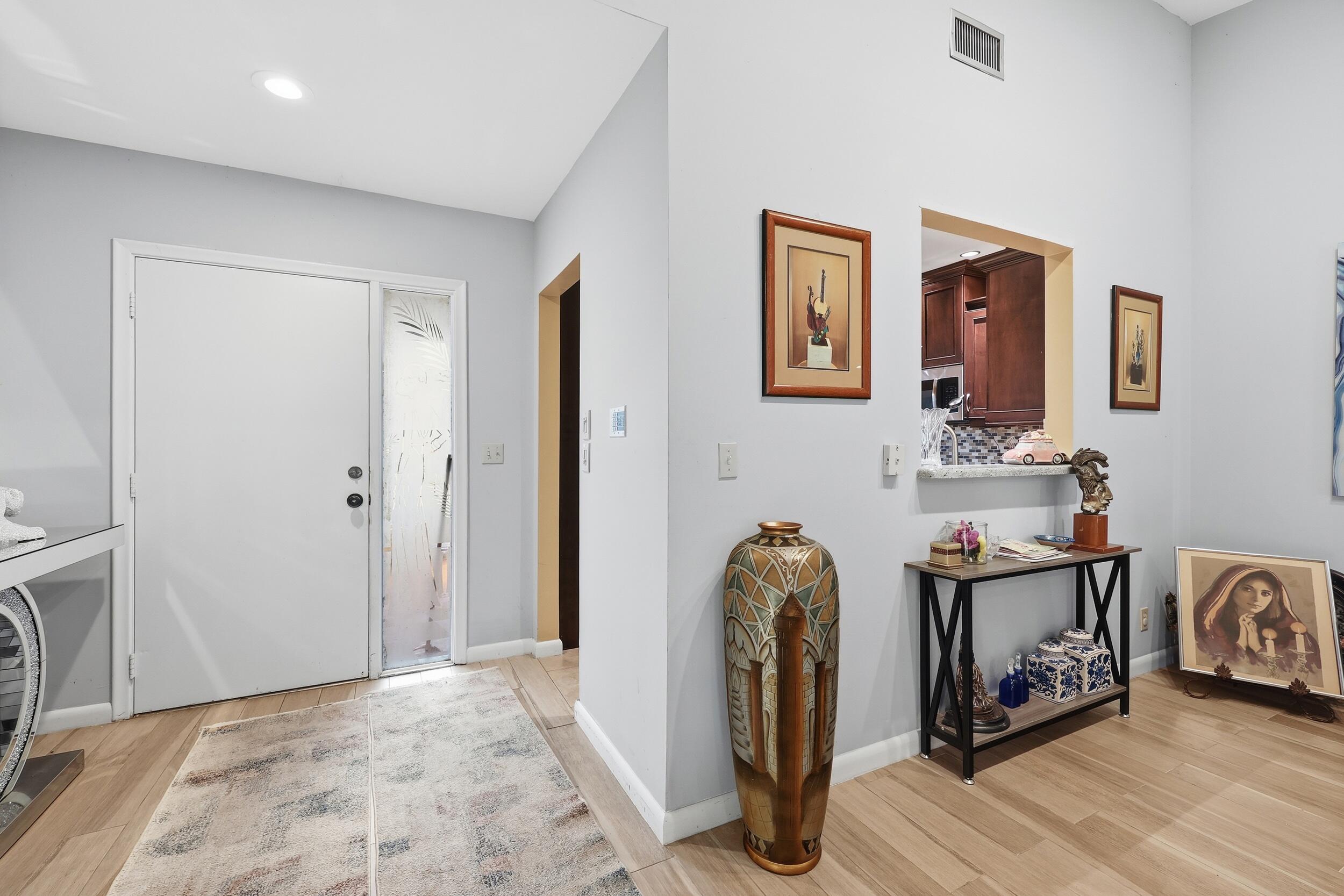 10768 Waterberry Drive Boca Raton, FL 33498 - Photo 2 of 26 a view of a storage & utility room
