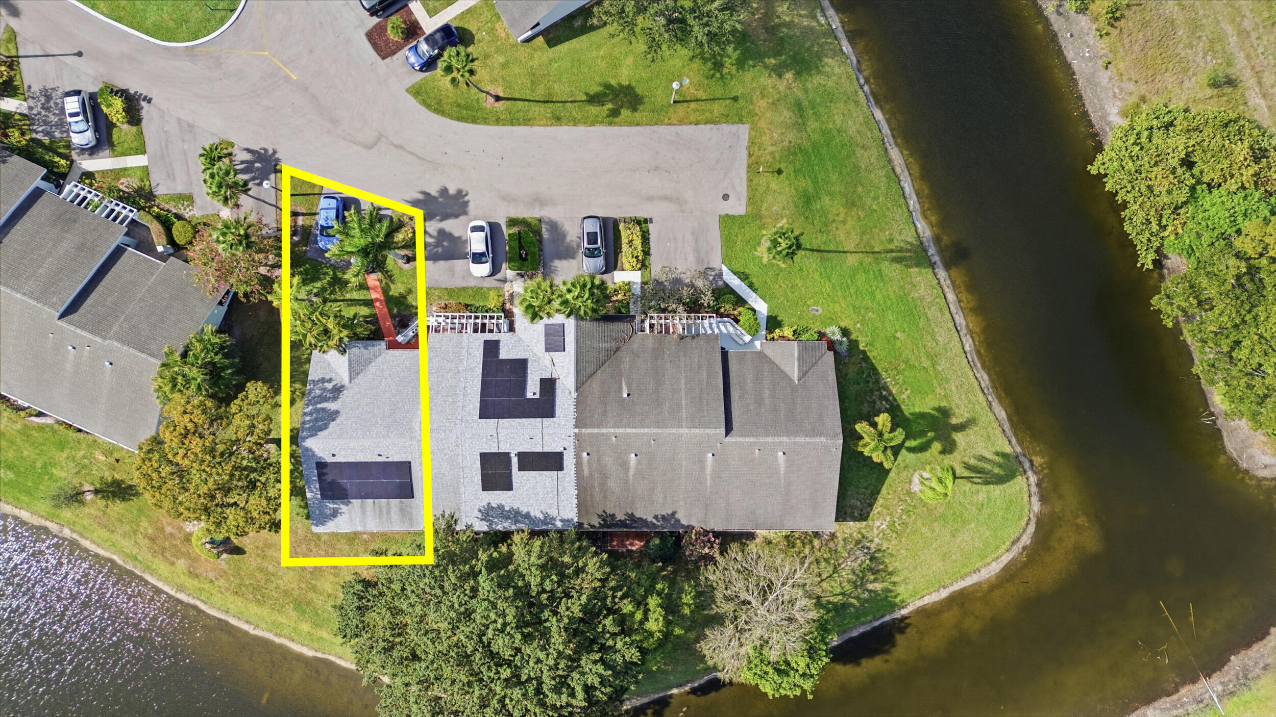 10768 Waterberry Drive Boca Raton, FL 33498 - Photo 26 of 26 an aerial view of a house with swimming pool and garden