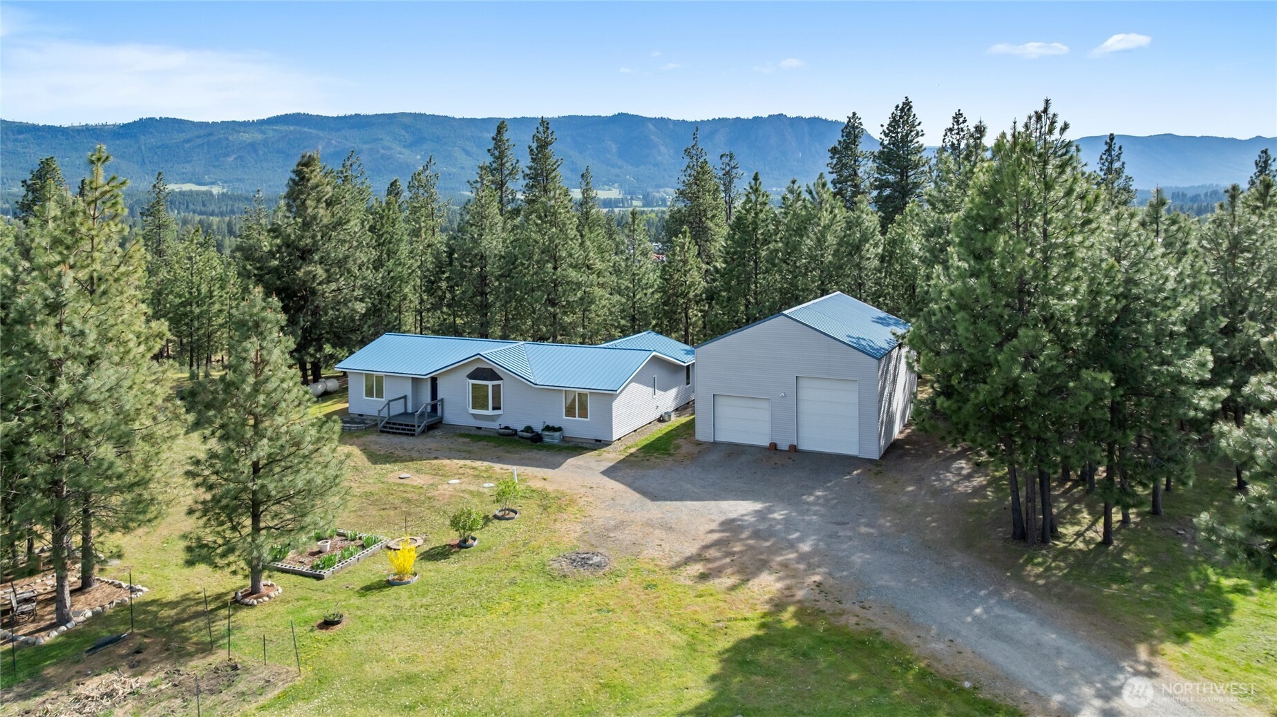 250 Danko Road Cle Elum, WA 98922 - Photo 1 of 38 a view of a house with a yard and large tree