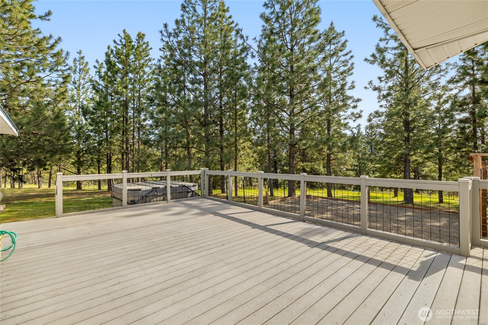 250 Danko Road Cle Elum, WA 98922 - Photo 12 of 38 a view of a balcony with wooden floor and fence