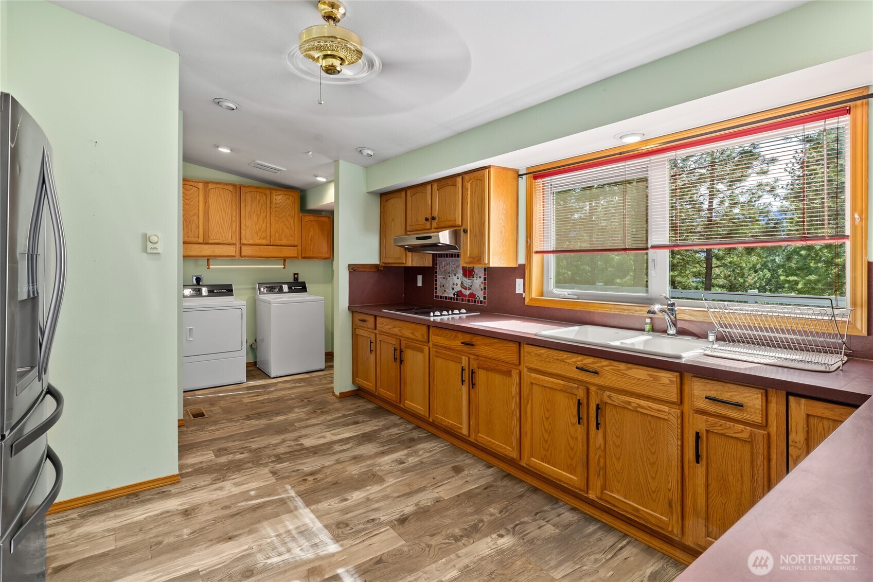 250 Danko Road Cle Elum, WA 98922 - Photo 25 of 38 a kitchen with stainless steel appliances granite countertop a sink a stove and a refrigerator