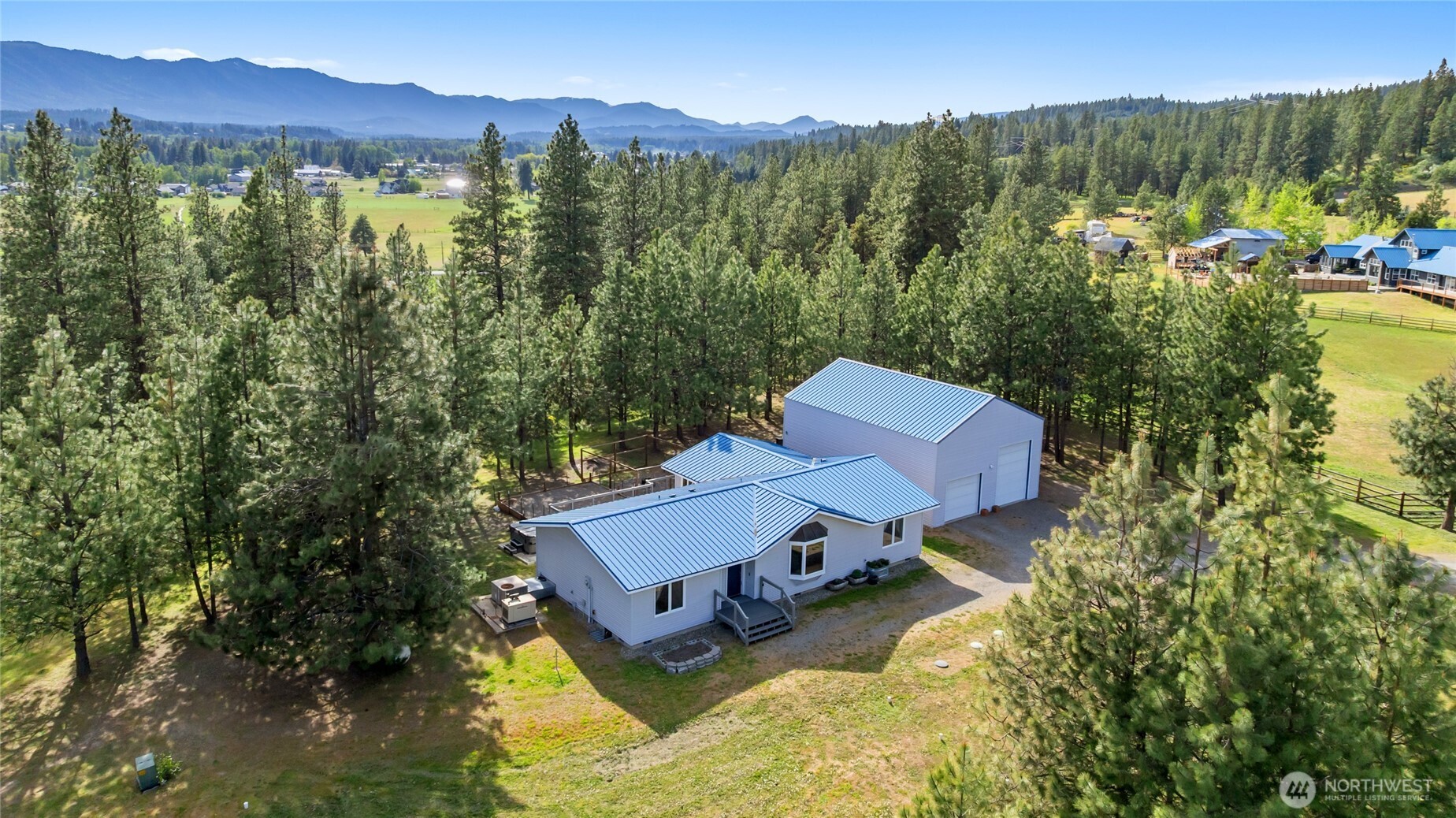250 Danko Road Cle Elum, WA 98922 - Photo 4 of 38 a view of a house with a mountain in the background