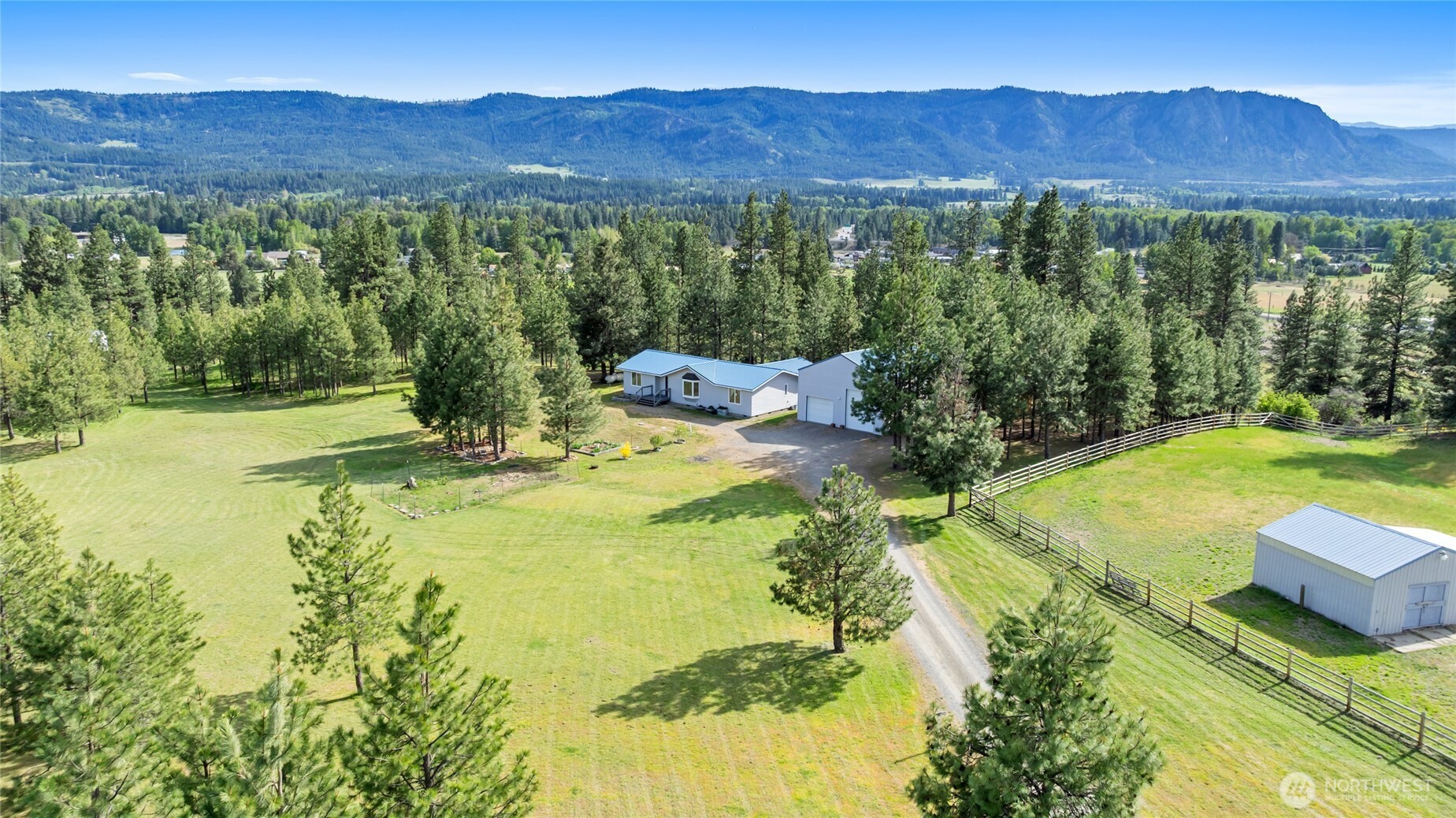 250 Danko Road Cle Elum, WA 98922 - Photo 6 of 38 a view of a house with pool and a yard