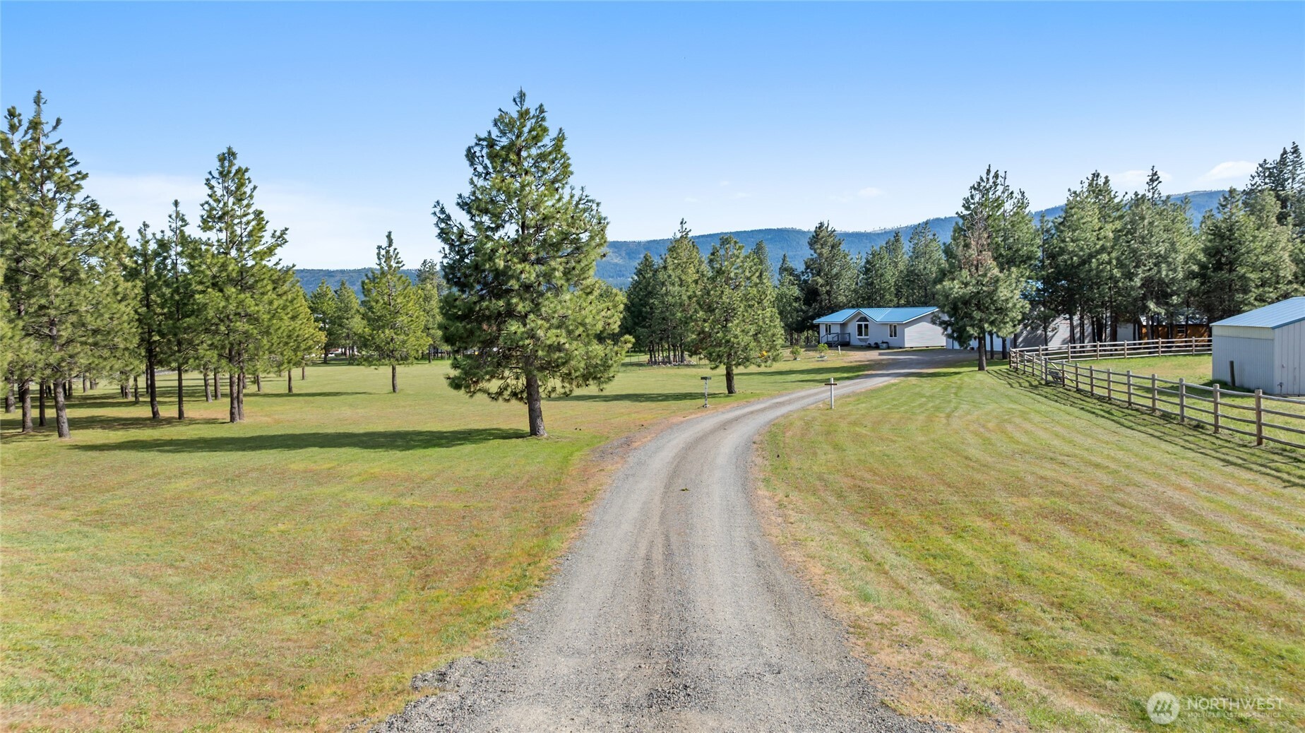 250 Danko Road Cle Elum, WA 98922 - Photo 8 of 38 a swimming pool with trees in the background