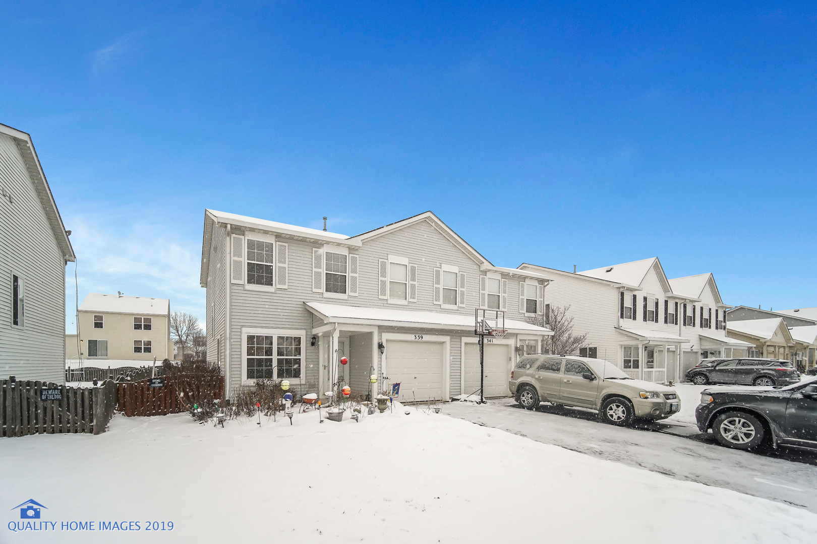 339 Reston Circle Romeoville, IL 60446 - Photo 1 of 26 a view of a car park in front of house