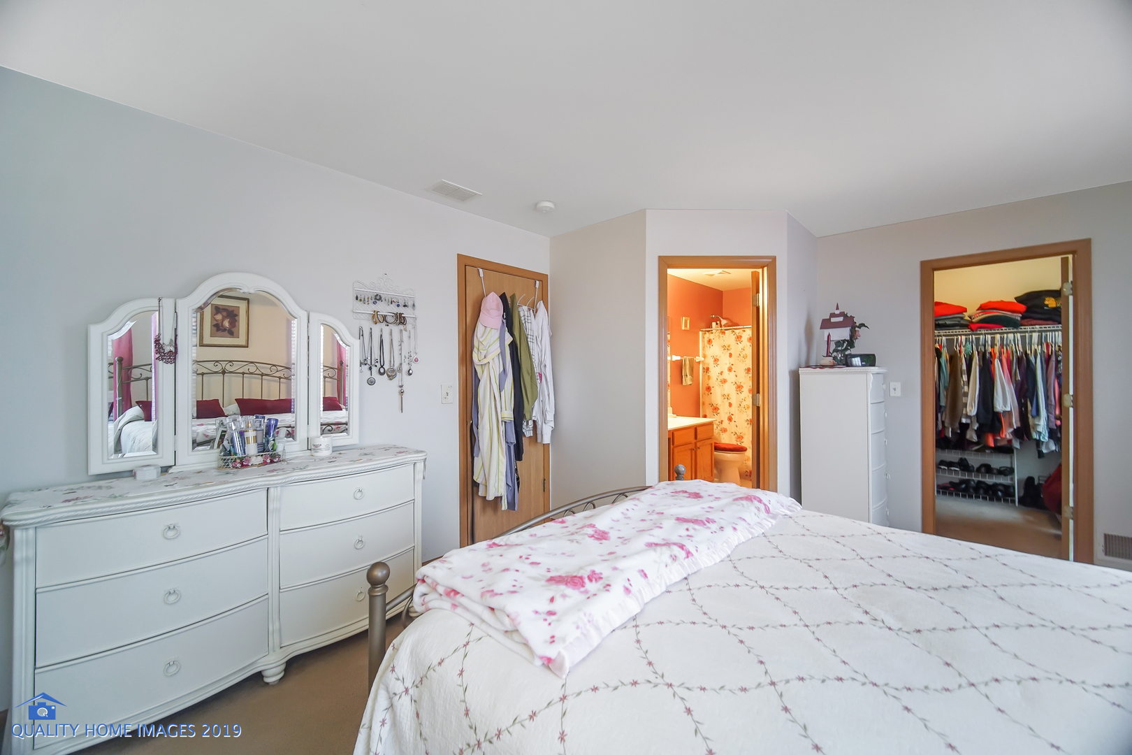 339 Reston Circle Romeoville, IL 60446 - Photo 18 of 26 a bedroom with a bed and a dresser