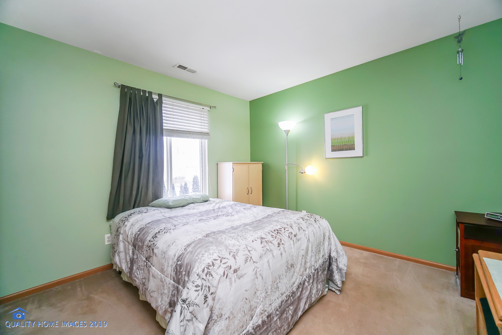 339 Reston Circle Romeoville, IL 60446 - Photo 20 of 26 a bedroom with a bed and a window