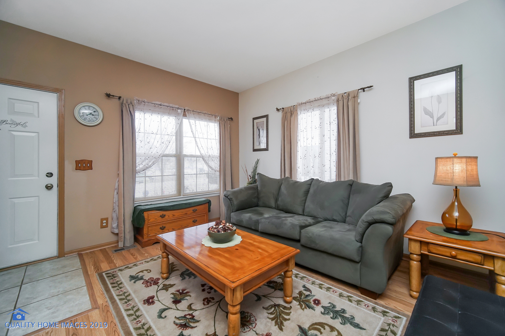 339 Reston Circle Romeoville, IL 60446 - Photo 6 of 26 a living room with furniture and a window