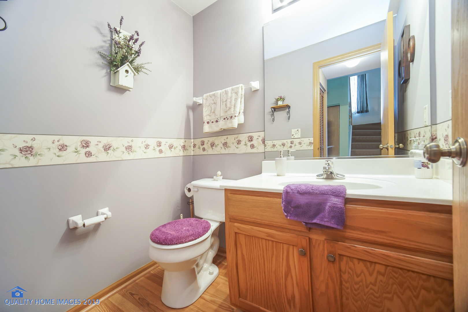 339 Reston Circle Romeoville, IL 60446 - Photo 8 of 26 a bathroom with a sink mirror vanity and toilet