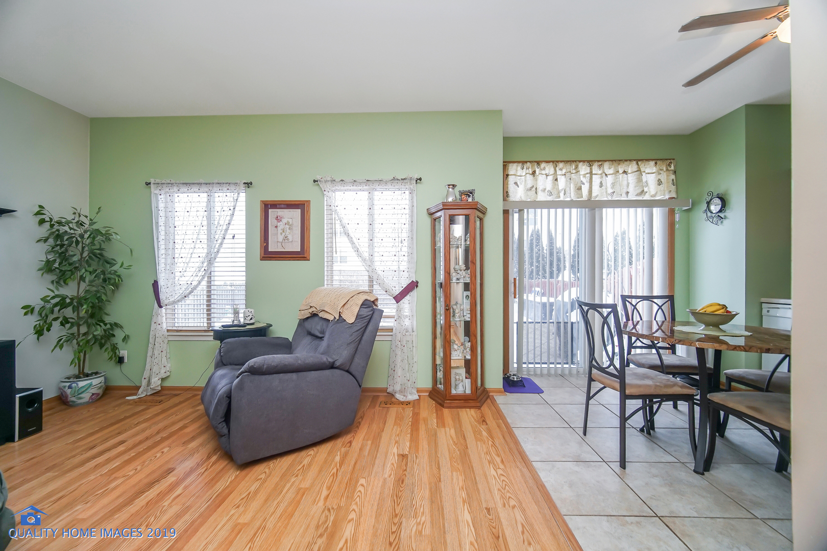 339 Reston Circle Romeoville, IL 60446 - Photo 9 of 26 a living room with furniture and a large window