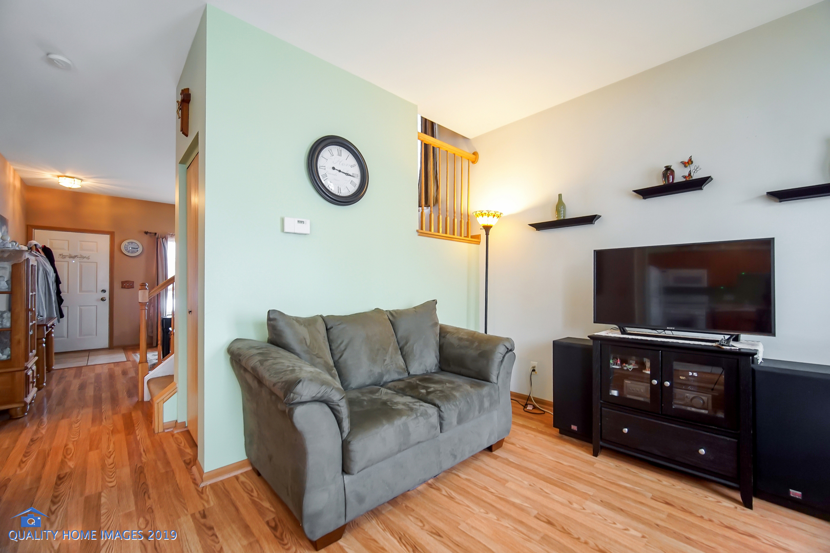 339 Reston Circle Romeoville, IL 60446 - Photo 10 of 26 a living room with furniture and a flat screen tv