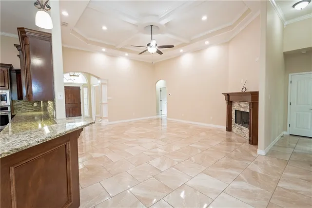a view of a kitchen with a sink and a chandelier