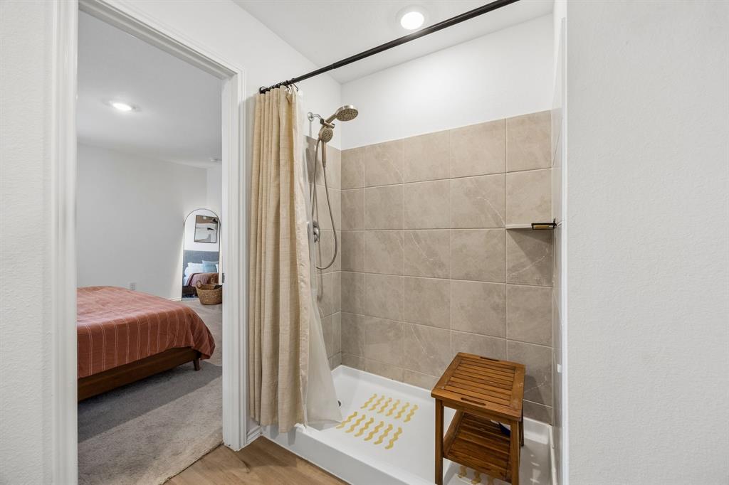 1025 Mountain Laurel Road Princeton, TX 75407 - Photo 14 of 30 a bedroom with a bed and a window