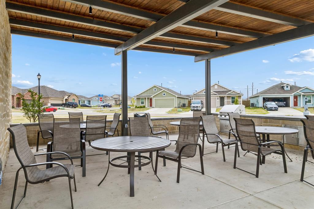 1025 Mountain Laurel Road Princeton, TX 75407 - Photo 28 of 30 a view of an outside dining space with furniture