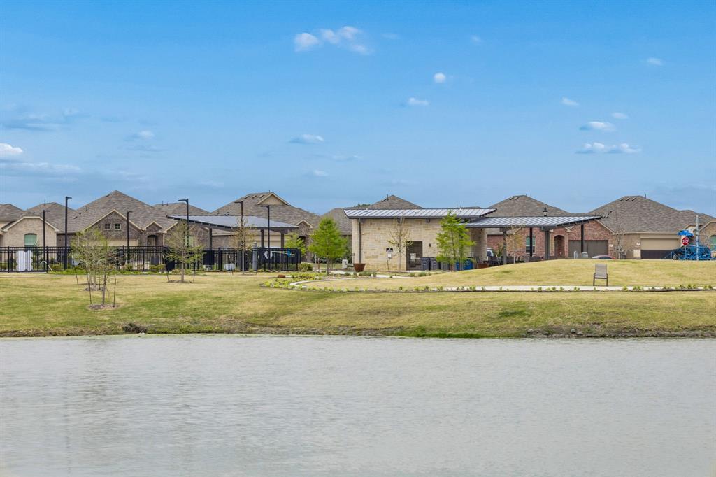 1025 Mountain Laurel Road Princeton, TX 75407 - Photo 29 of 30 a front view of a house with a yard