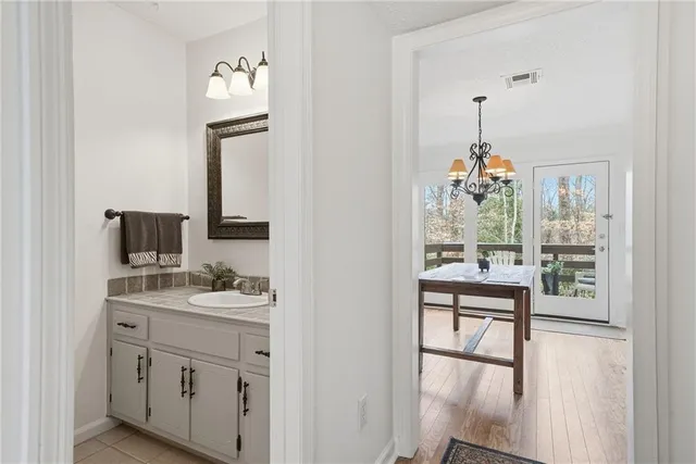 a view of bathroom with dual sinks
