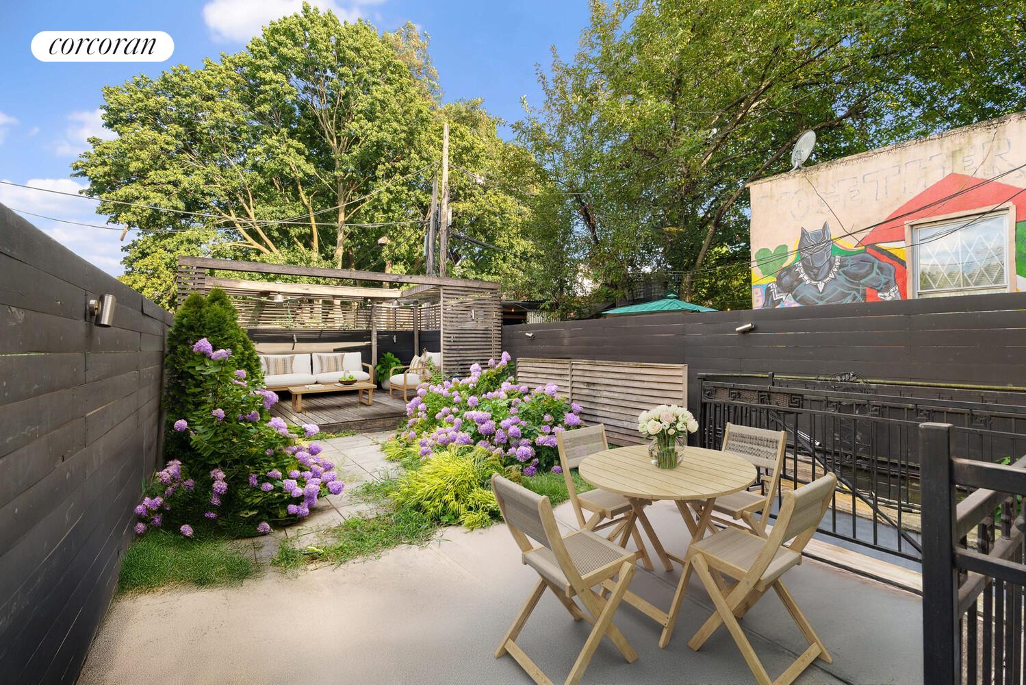 139 Rochester Avenue Brooklyn, NY 11213 - Photo 10 of 17 a view of a chairs and table in the patio