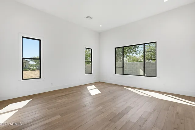 an empty room with windows