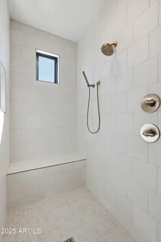 a terrace with outdoor seating and city view