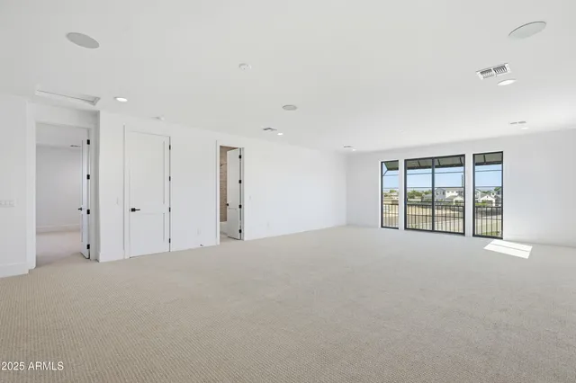 an aerial view of a house with a swimming pool