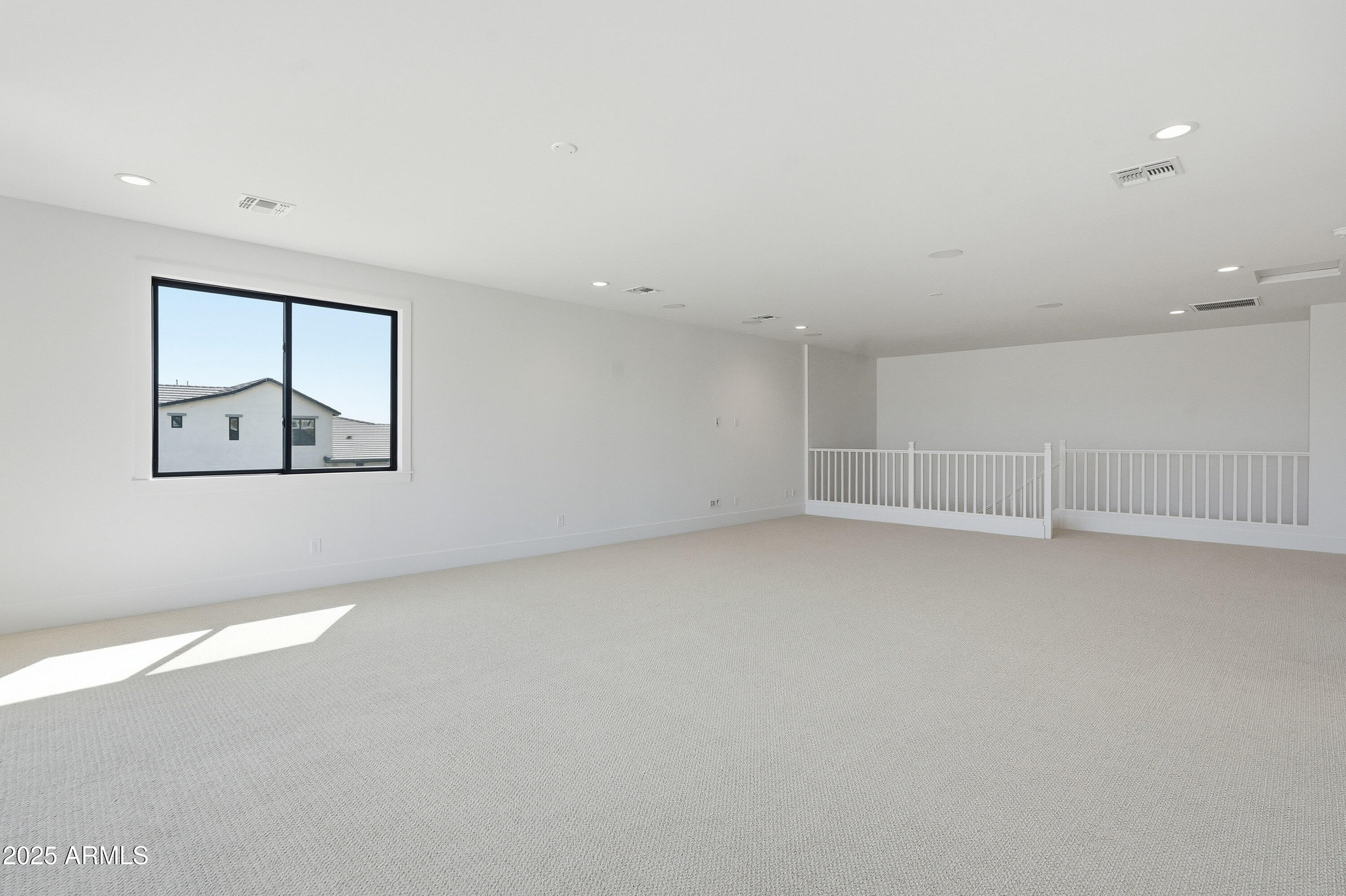 3326 South Stuart Court Gilbert, AZ 85297 - Photo 37 of 88 an empty room with windows