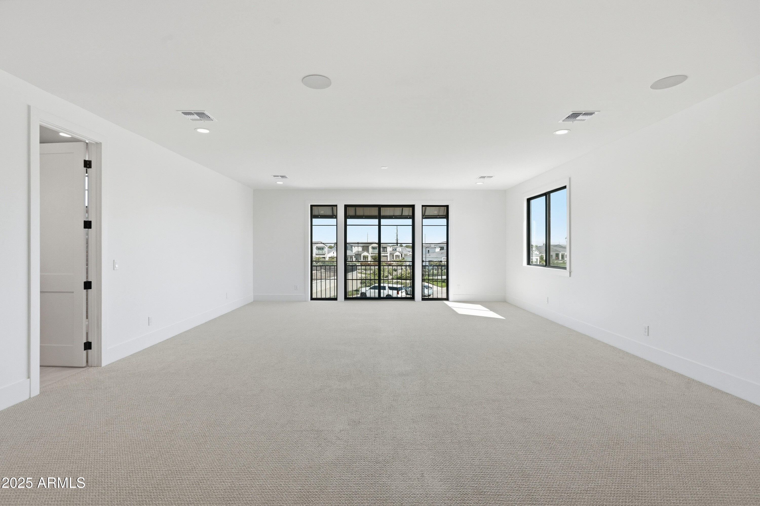 3326 South Stuart Court Gilbert, AZ 85297 - Photo 38 of 88 a view of an empty room with a window