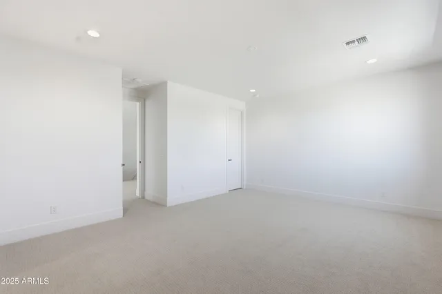 a front view of a house with a yard table and chairs