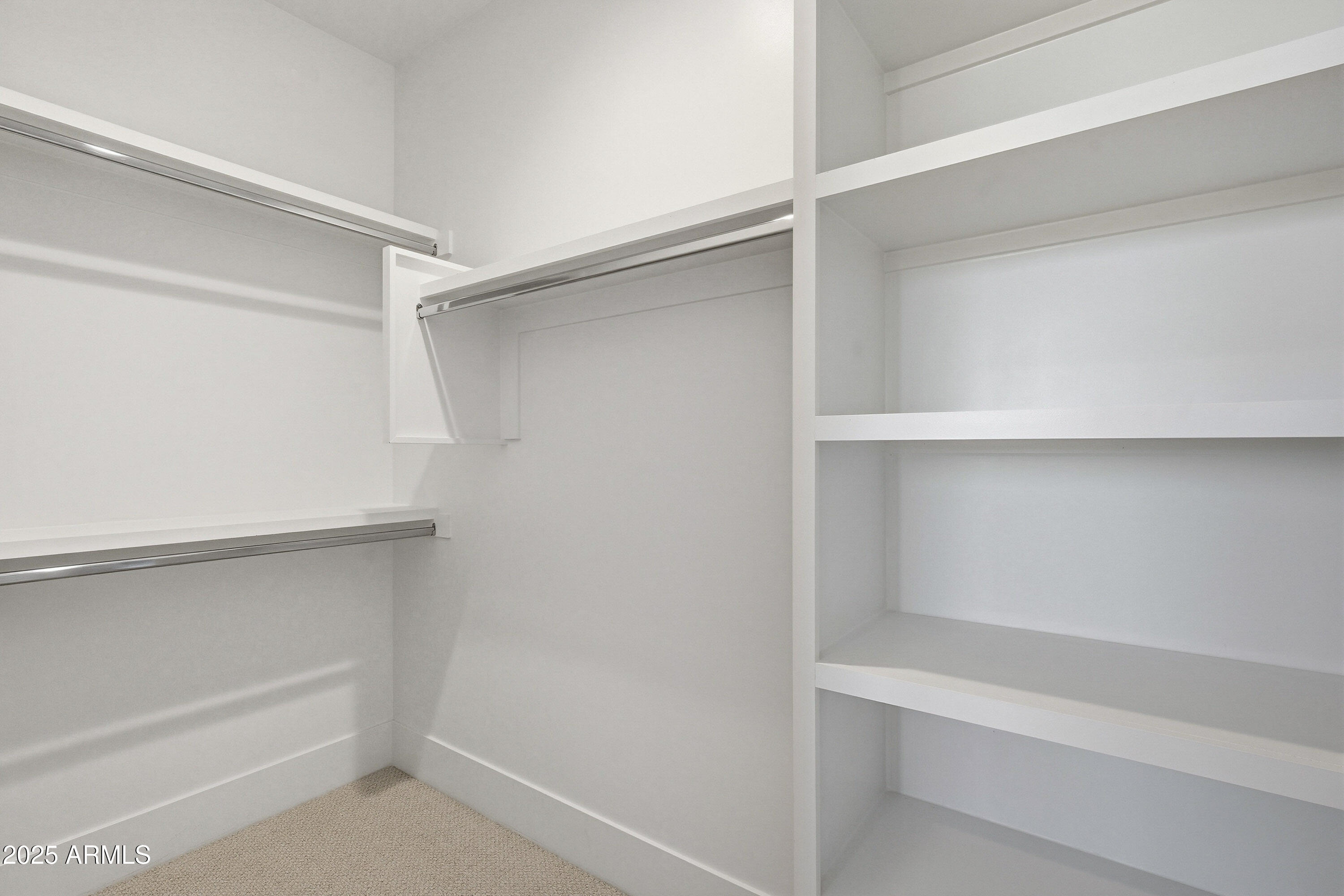 3326 South Stuart Court Gilbert, AZ 85297 - Photo 40 of 88 a view of an empty walk in closet