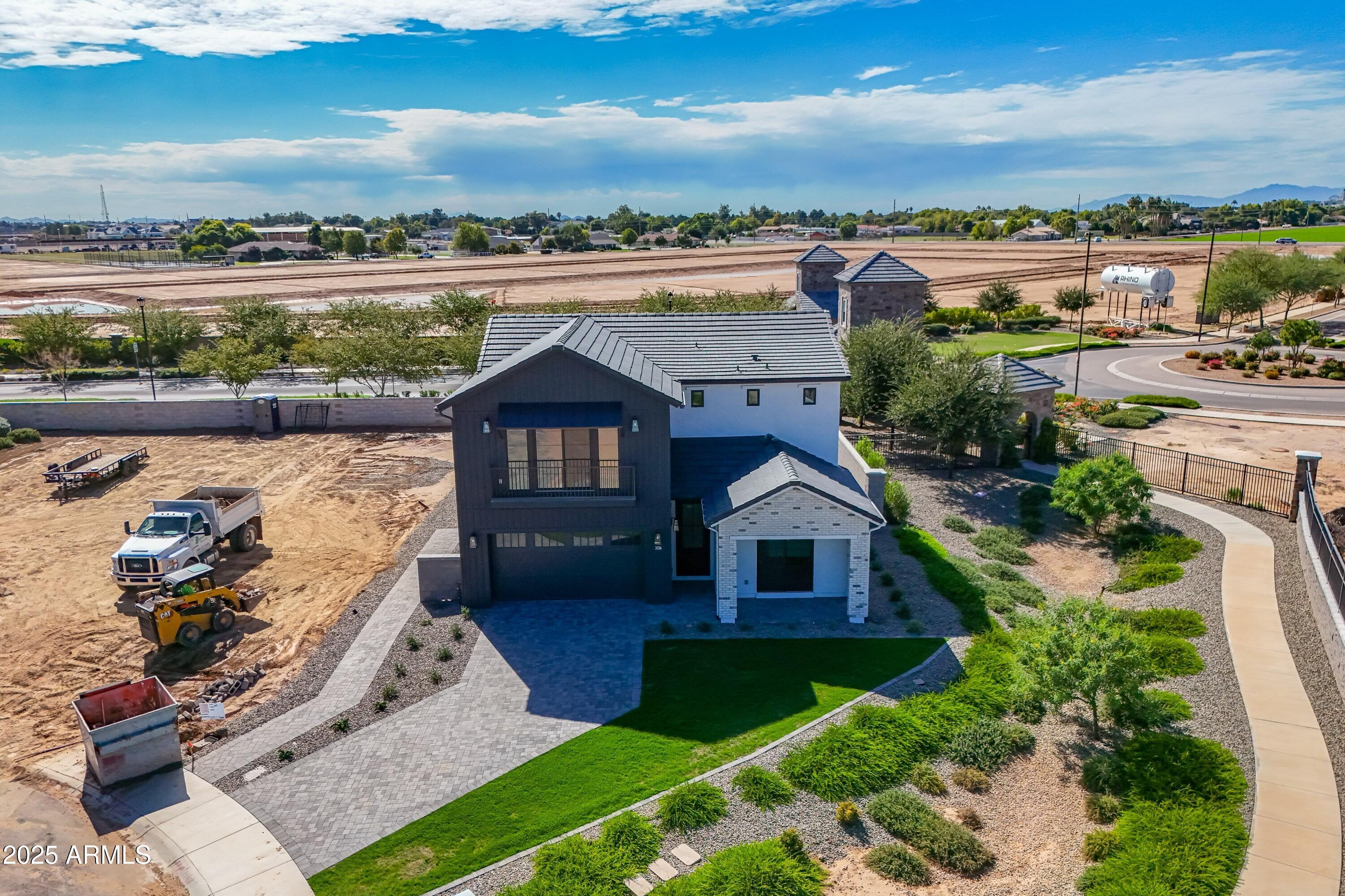 3326 South Stuart Court Gilbert, AZ 85297 - Photo 4 of 88 an aerial view of a house with a yard basket ball court and outdoor seating