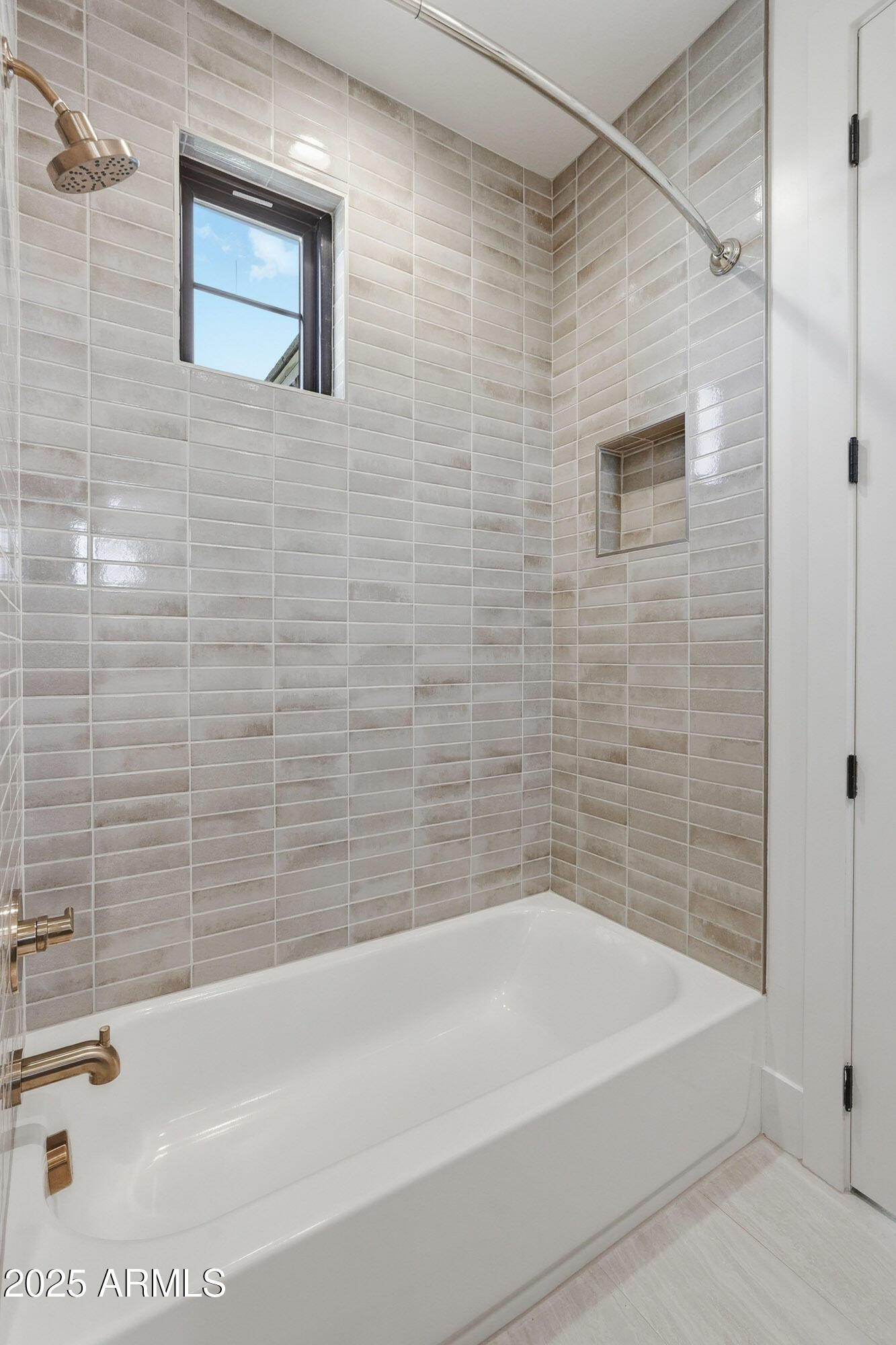 3326 South Stuart Court Gilbert, AZ 85297 - Photo 43 of 88 a bathroom with a shower and a bathtub