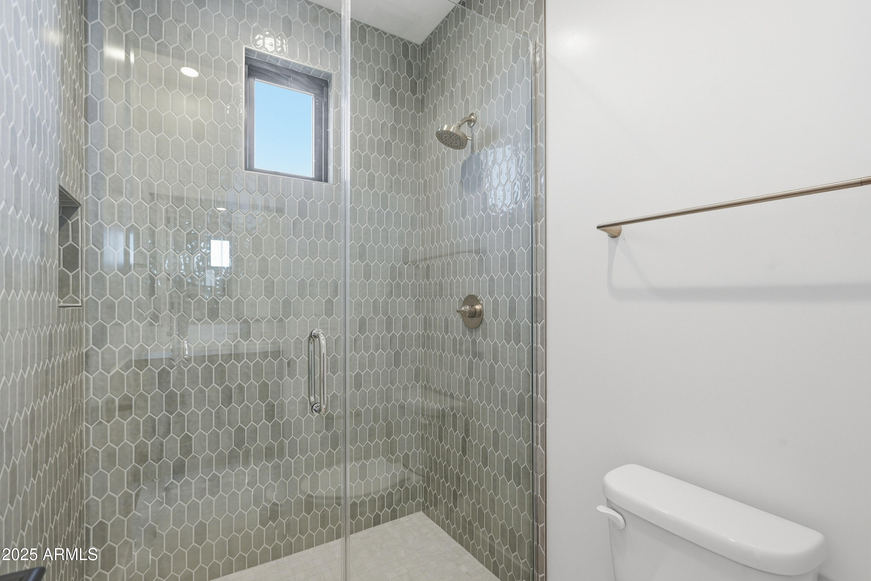 3326 South Stuart Court Gilbert, AZ 85297 - Photo 45 of 88 a bathroom with a shower and toilet