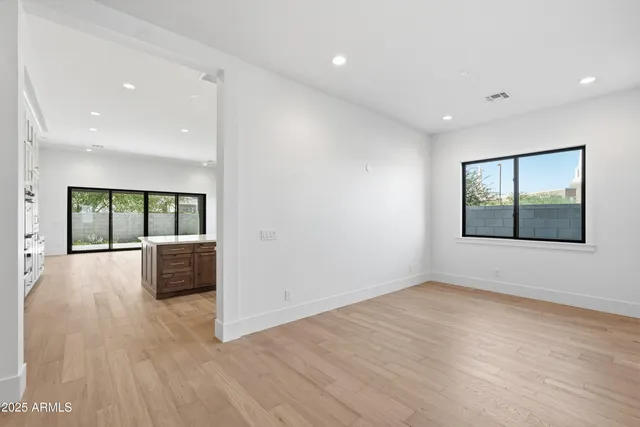 a view of a swimming pool with chairs
