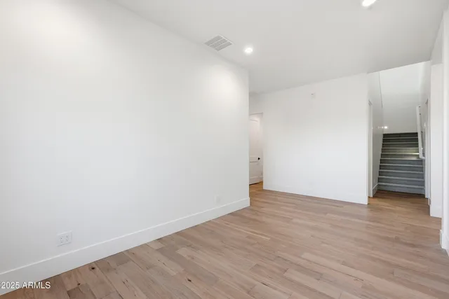 a outdoor living space with patio furniture and a grill