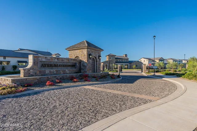 a kitchen with a stove a sink and a refrigerator
