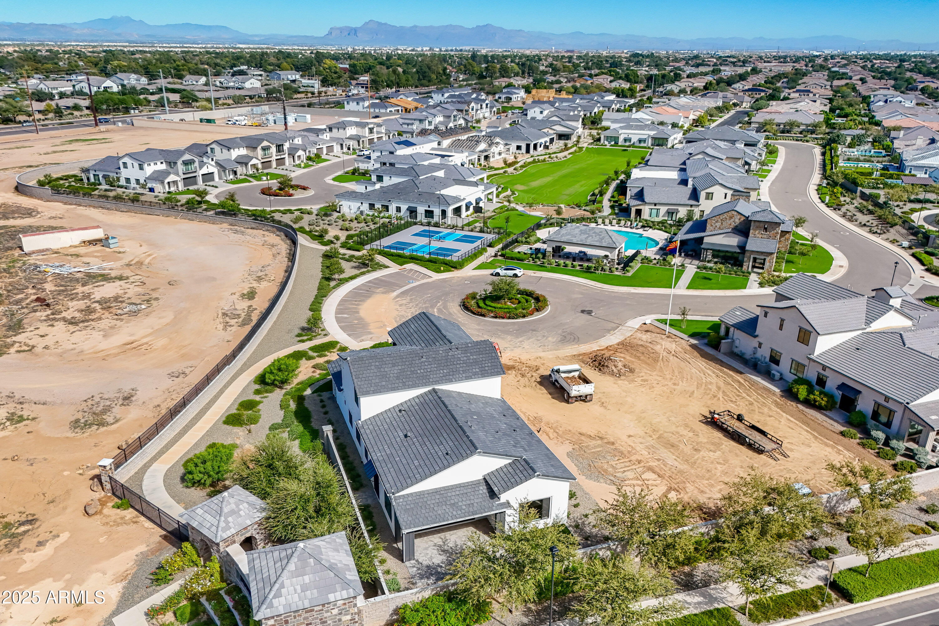 3326 South Stuart Court Gilbert, AZ 85297 - Photo 61 of 88 an aerial view of a house with a swimming pool