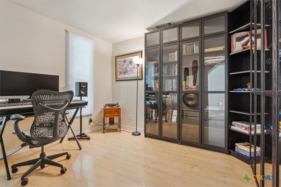 5306 Denmans Loop Belton, TX 76513 - Photo 12 of 46 a workspace with a desk and a chair