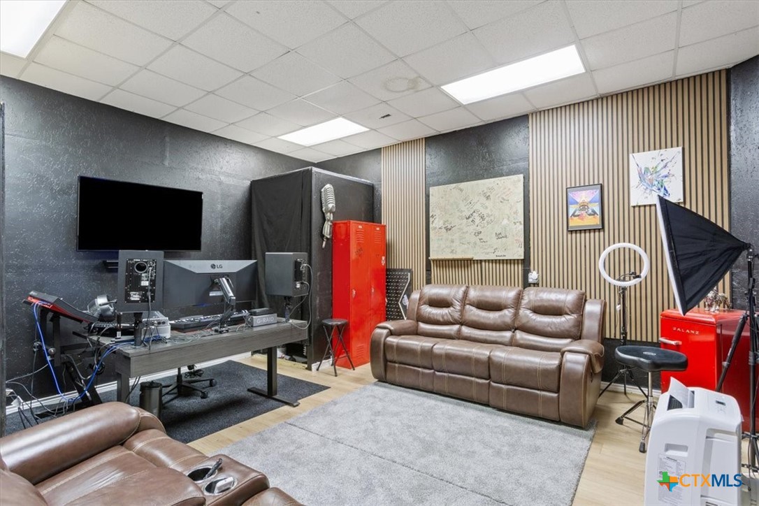 5306 Denmans Loop Belton, TX 76513 - Photo 23 of 46 a living room with furniture and a flat screen tv