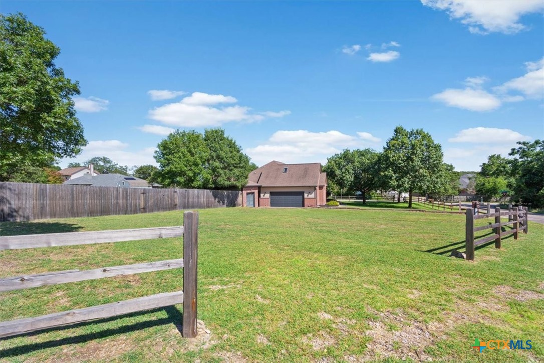 5306 Denmans Loop Belton, TX 76513 - Photo 39 of 46 a view of a backyard with a garden