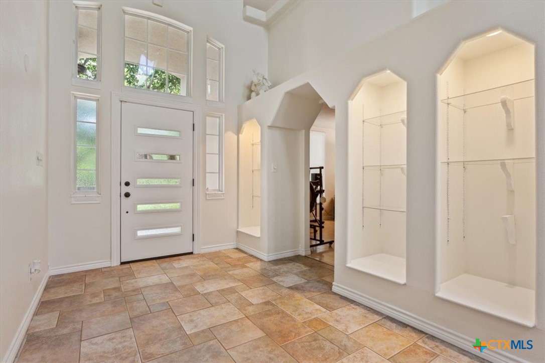 5306 Denmans Loop Belton, TX 76513 - Photo 4 of 46 an empty room with closet and mirror