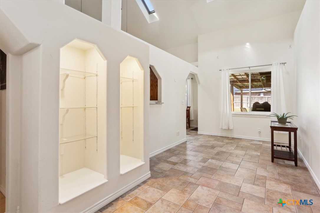 5306 Denmans Loop Belton, TX 76513 - Photo 5 of 46 a view of empty room with windows and wardrobe