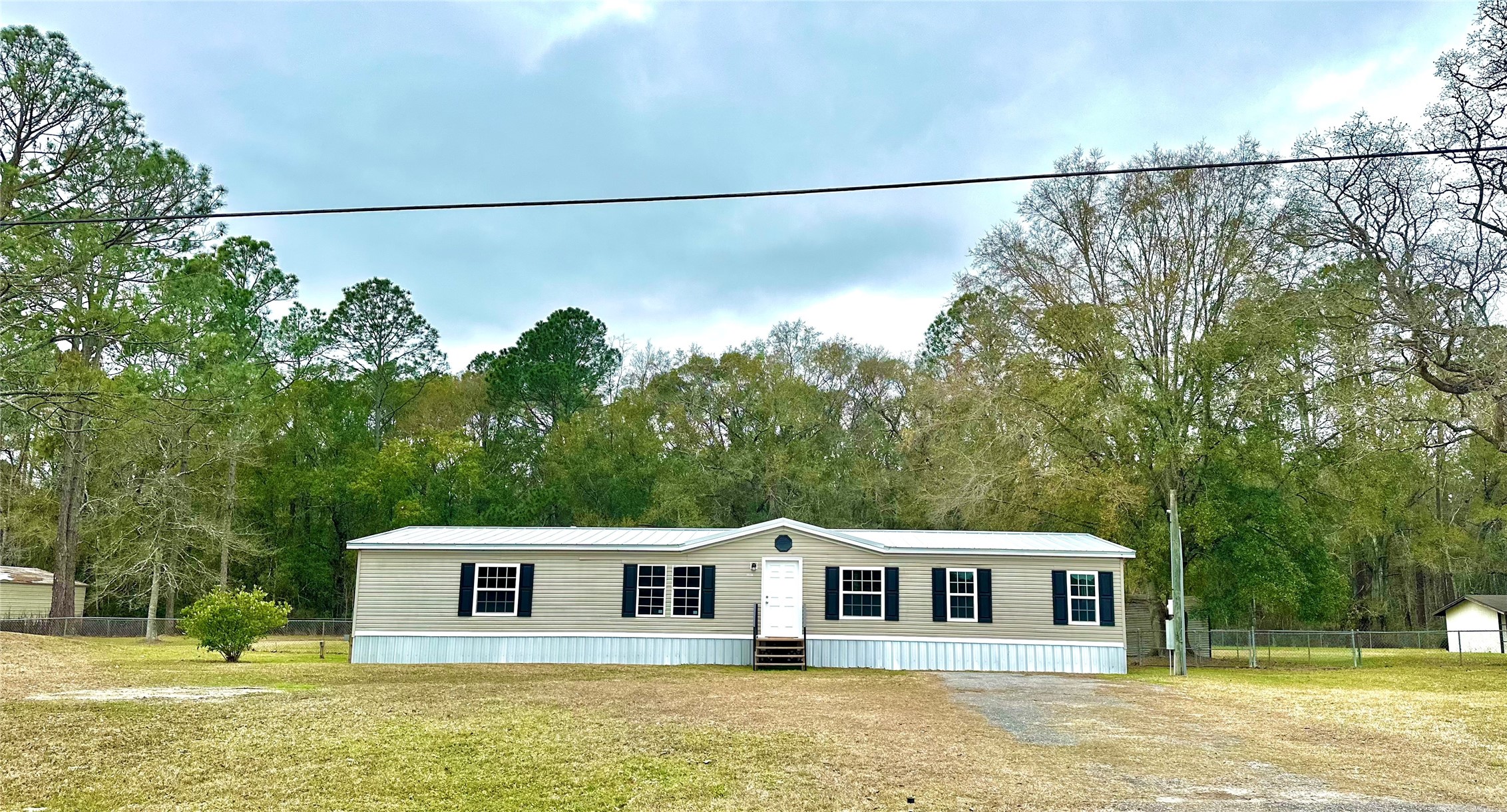 a view of a house with a swimming pool
